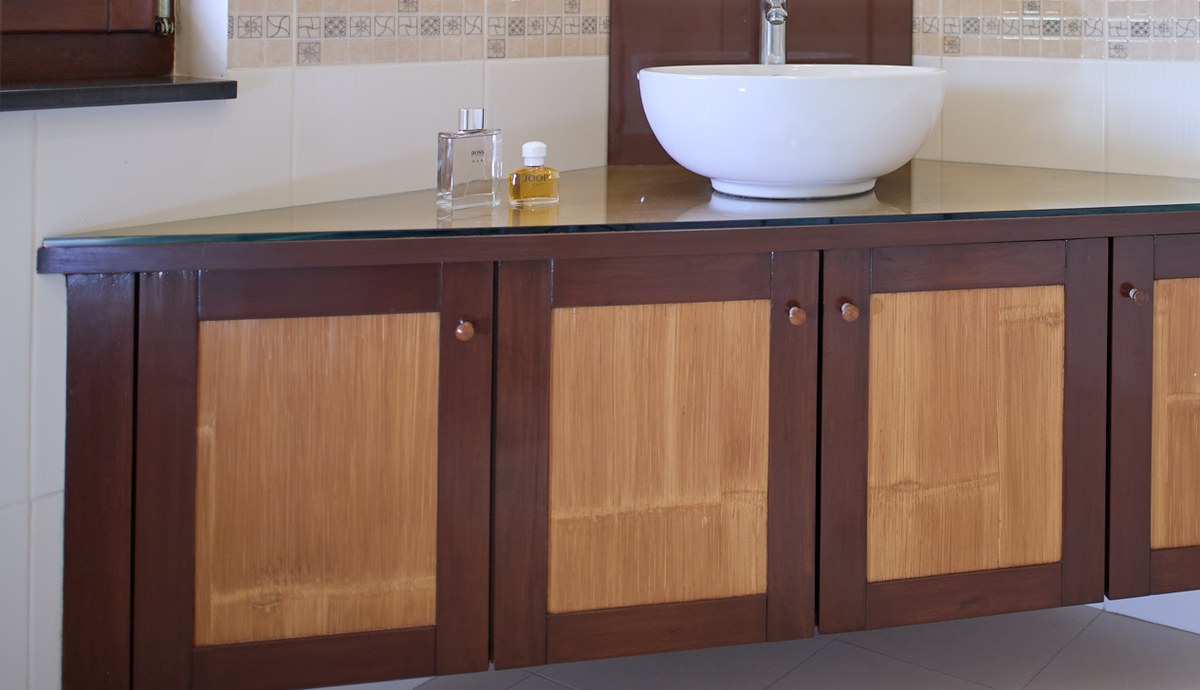 Bathroom vanity made on site, with bamboo doors