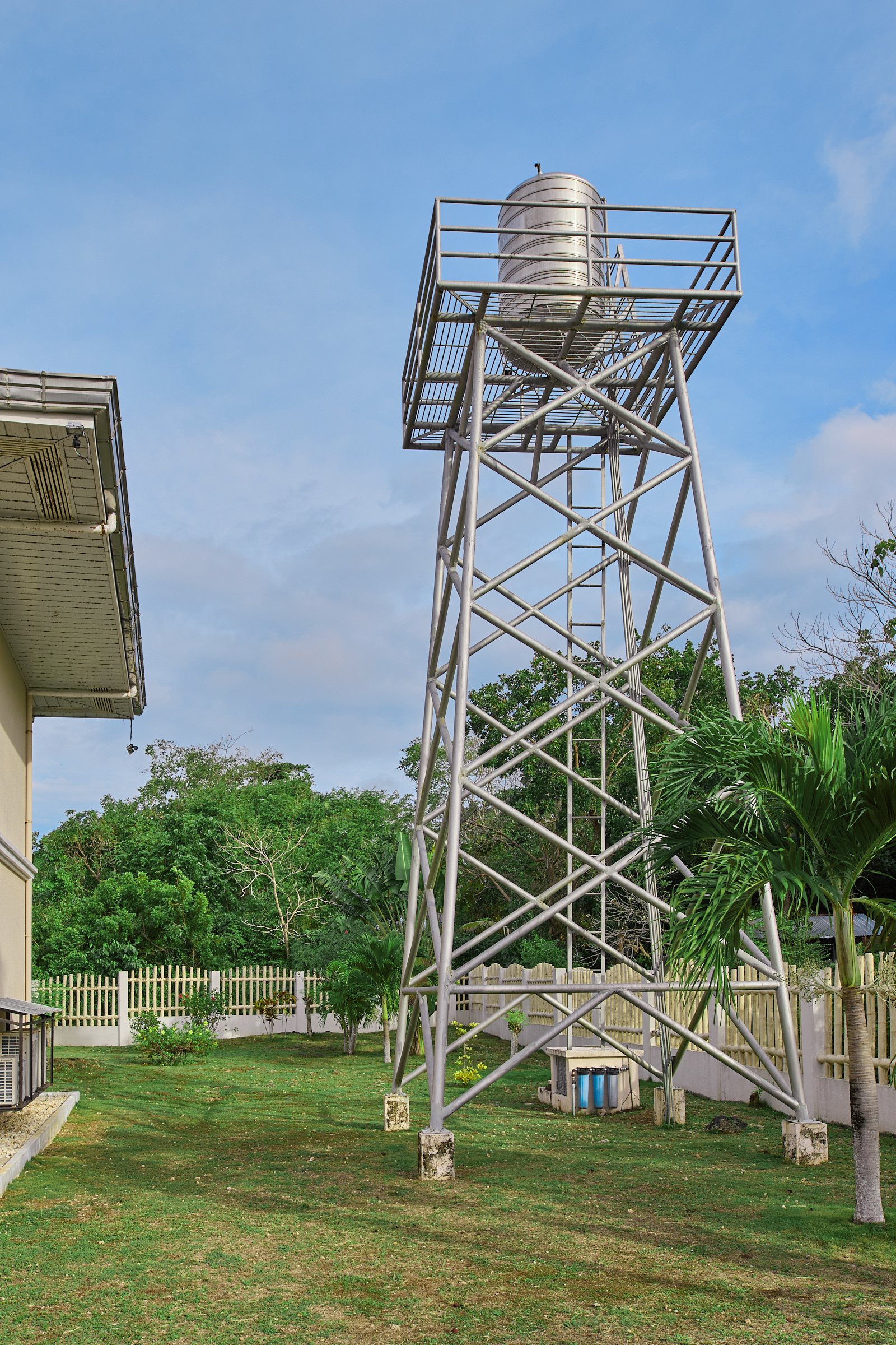Elevated water tank with filter station